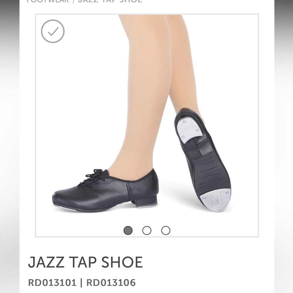 Gently use excellent condition revolution jazz, tap shoe. Black tie. Sz. 8 1/2.